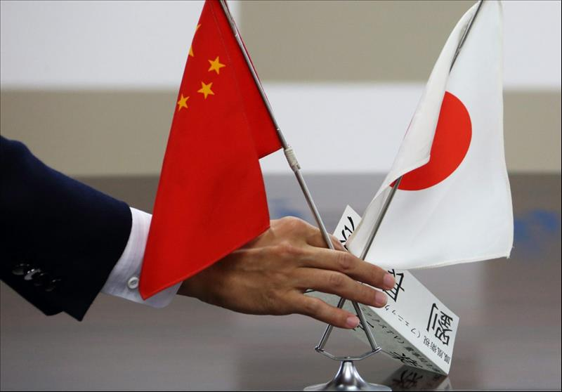 China Warns Japan of Retaliation Over Chip Curbs