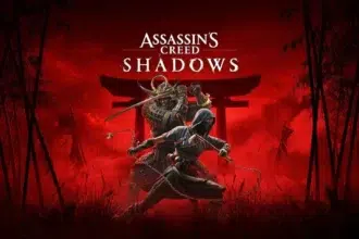 A hooded assassin and a samurai warrior stand in front of a red backdrop with a Torii gate silhouette, bamboo stalks, and the "Assassin’s Creed Shadows" logo overhead.